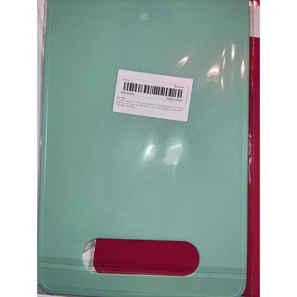 Set Of Four Thin Plastic Cutting Boards 71/2 inches by 11 1/2 inches